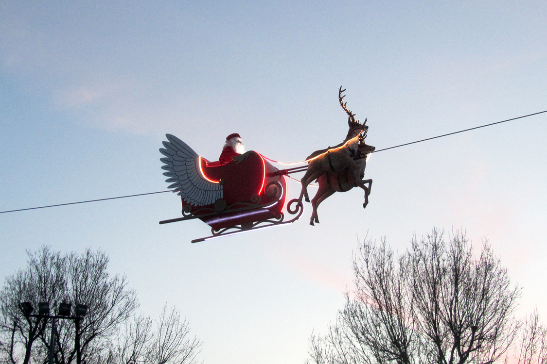 Funambule en traineau de Noël